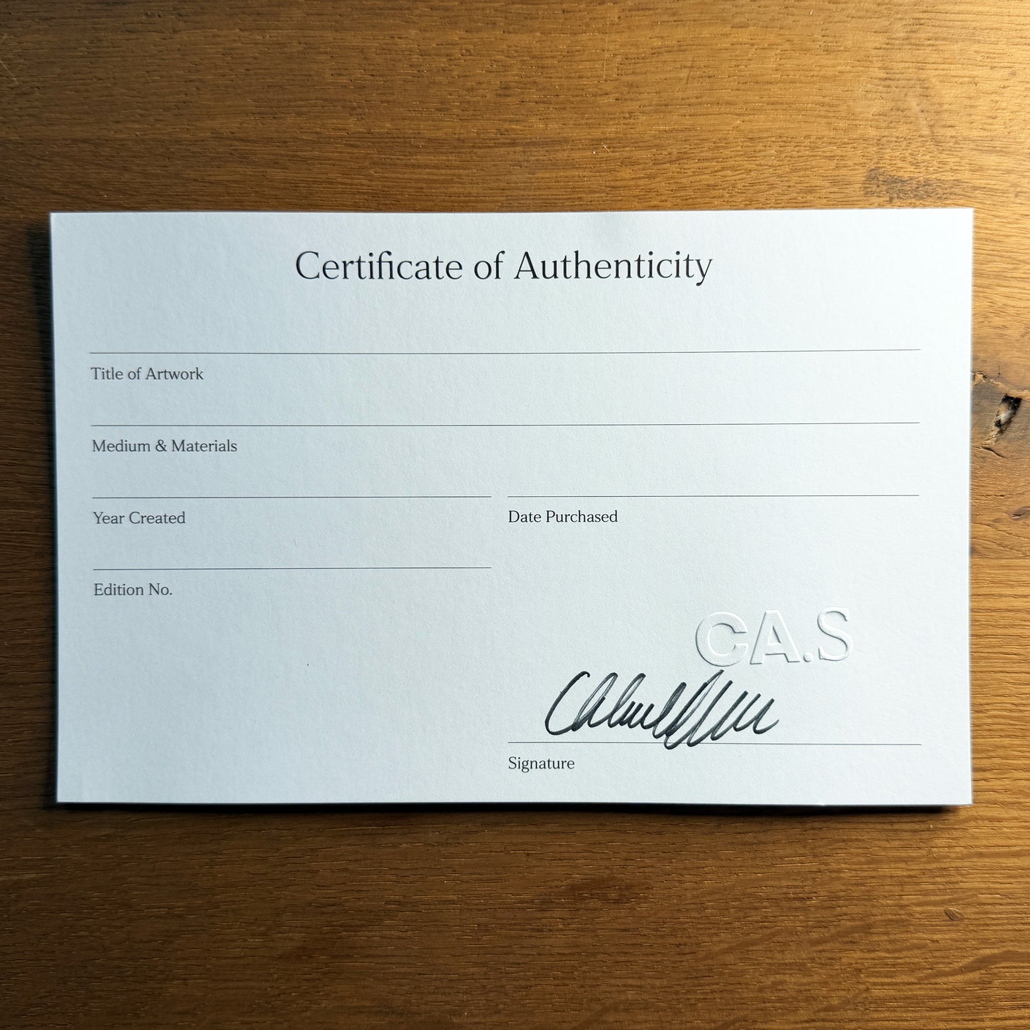 Certificate of authenticity for a Chloe Albert limited edition fine art print, hand-signed and embossed with the studio seal, with fields for title, medium, year, and edition number.