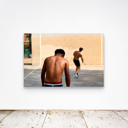 Chloe Albert's fine art print '18 Carat' shown unframed at 60 by 40 inches on a gallery wall above a concrete floor, displaying the large statement size in a room.