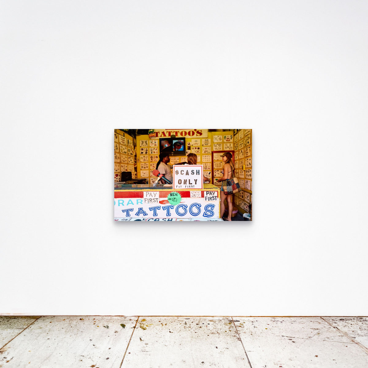 Chloe Albert's fine art print 'Cash Only' shown unframed at 36 by 24 inches on a gallery wall, displaying the print at scale in a room setting.