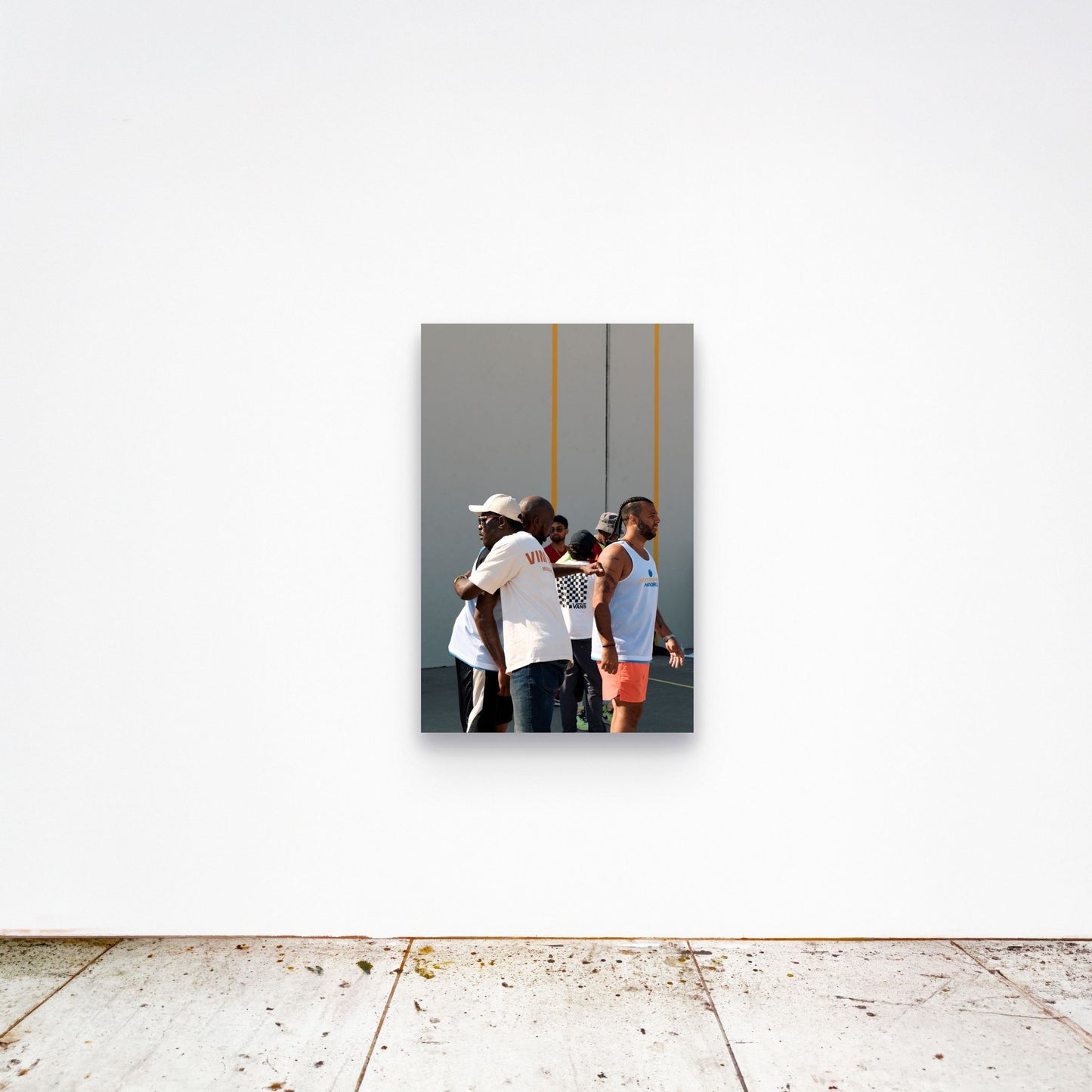 Chloe Albert's fine art print 'Chosen Family' shown unframed at 36 by 24 inches on a gallery wall, displaying the print at scale in a room setting.