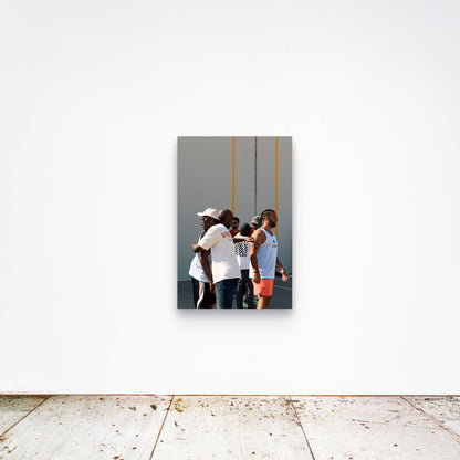 Chloe Albert's fine art print 'Chosen Family' shown unframed at 36 by 24 inches on a gallery wall, displaying the print at scale in a room setting.