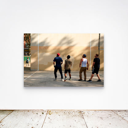 Chloe Albert's fine art print 'Collective Gaze' shown unframed at 60 by 40 inches on a gallery wall above a concrete floor, displaying the large statement size in a room.