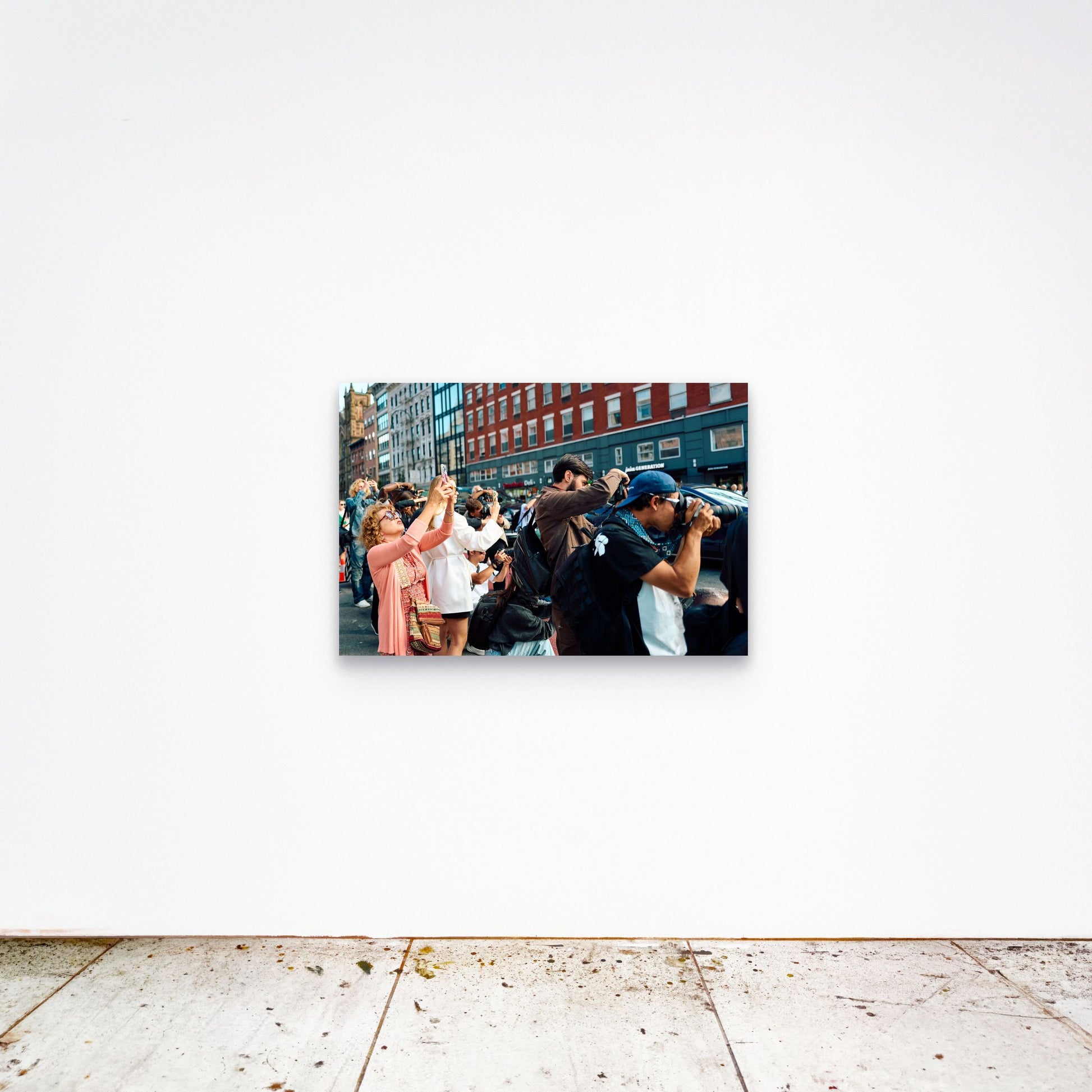 Chloe Albert's fine art print 'Crowd' shown unframed at 36 by 24 inches on a gallery wall, displaying the print at scale in a room setting.