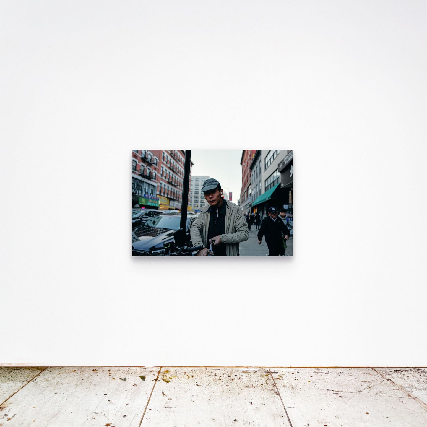 Chloe Albert's fine art print 'Delivery Driver' shown unframed at 36 by 24 inches on a gallery wall, displaying the print at scale in a room setting.