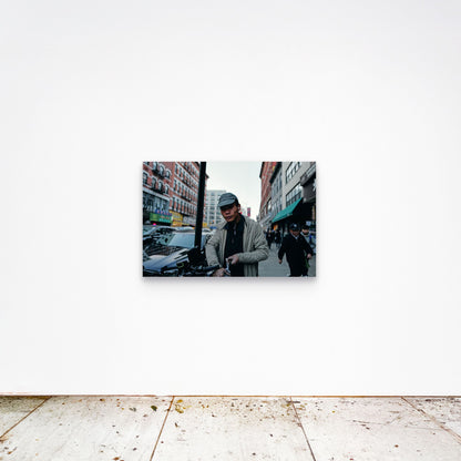 Chloe Albert's fine art print 'Delivery Driver' shown unframed at 36 by 24 inches on a gallery wall, displaying the print at scale in a room setting.