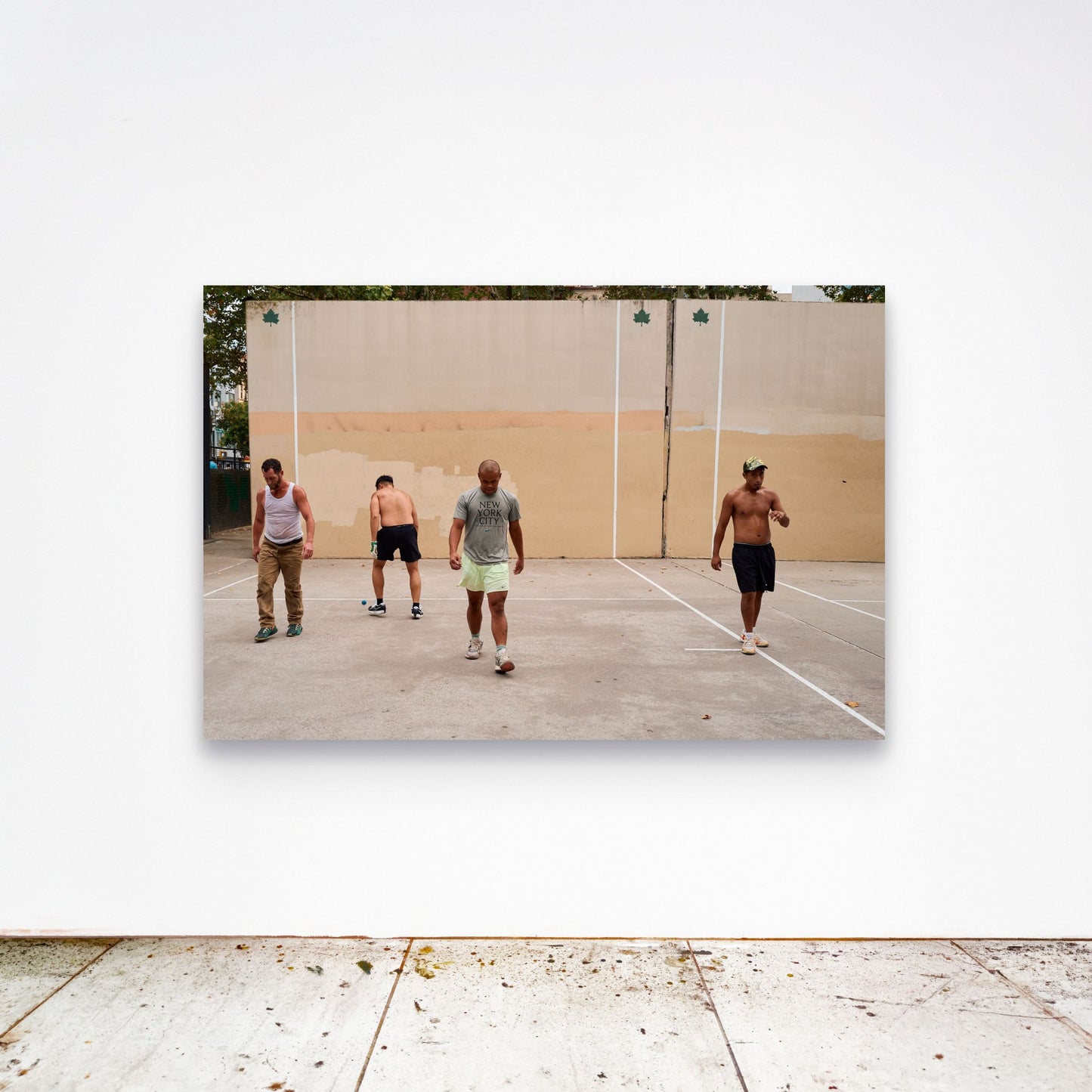 Chloe Albert's fine art print 'Hold The Line' shown unframed at 60 by 40 inches on a gallery wall above a concrete floor, displaying the large statement size in a room.