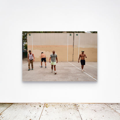 Chloe Albert's fine art print 'Hold The Line' shown unframed at 60 by 40 inches on a gallery wall above a concrete floor, displaying the large statement size in a room.