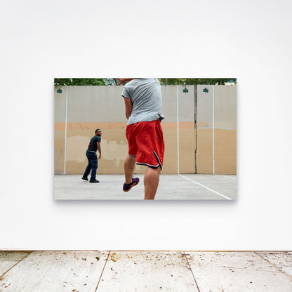 Chloe Albert's fine art print 'Holy State' shown unframed at 60 by 40 inches on a gallery wall above a concrete floor, displaying the large statement size in a room.