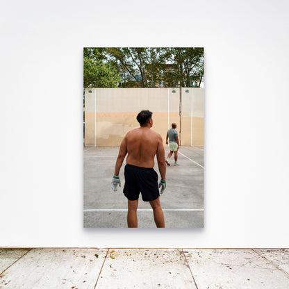 Chloe Albert's fine art print 'Mirrored Distance' shown unframed at 60 by 40 inches on a gallery wall above a concrete floor, displaying the large statement size in a room.