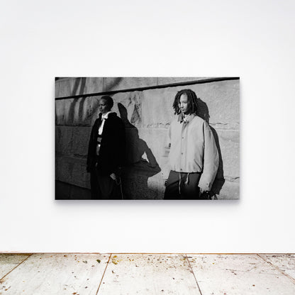 Chloe Albert's fine art print 'Models' shown unframed at 60 by 40 inches on a gallery wall above a concrete floor, displaying the large statement size in a room.