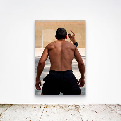Chloe Albert's fine art print 'Monolith' shown unframed at 60 by 40 inches on a gallery wall above a concrete floor, displaying the large statement size in a room.