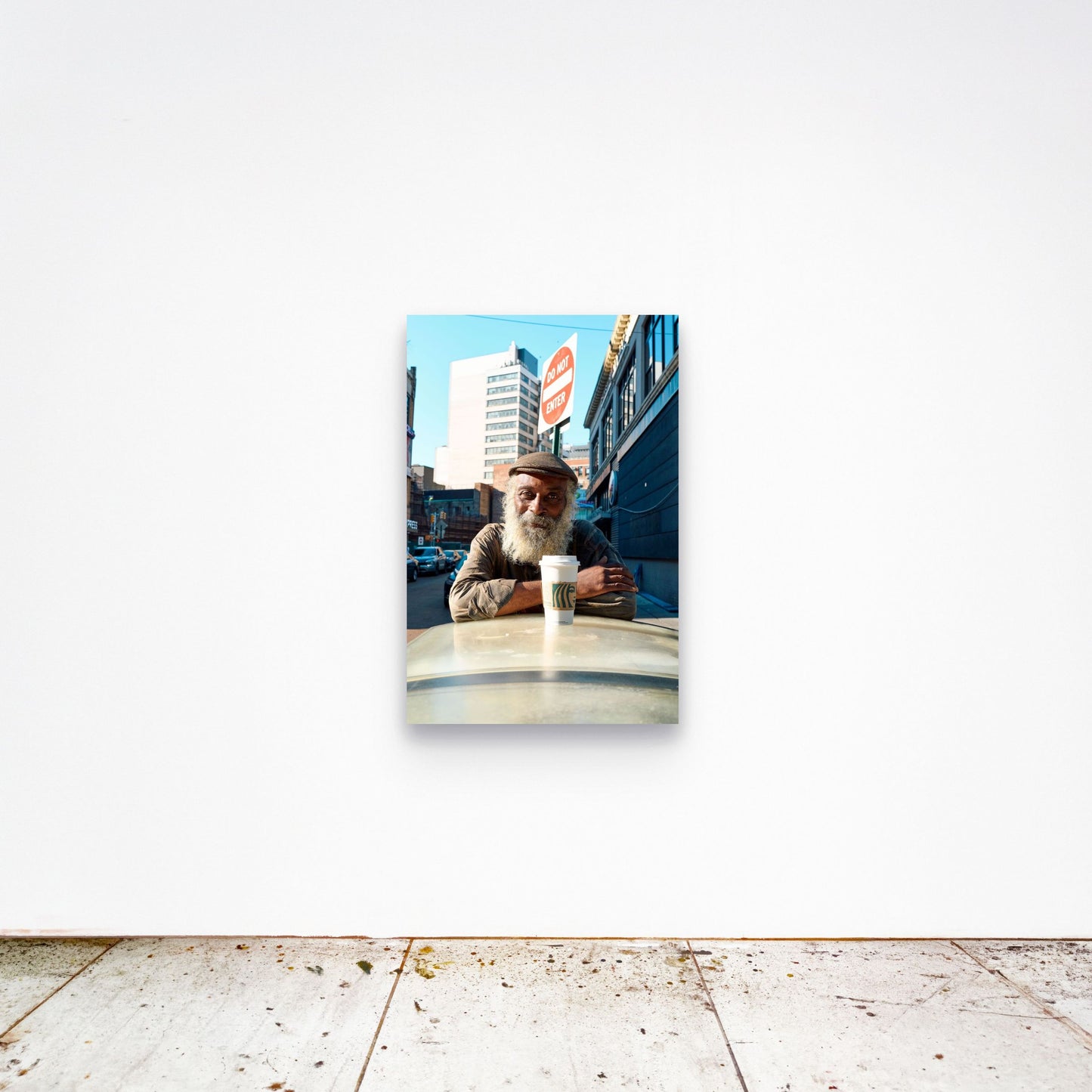 Chloe Albert's fine art print 'Morning Coffee' shown unframed at 36 by 24 inches on a gallery wall, displaying the print at scale in a room setting.