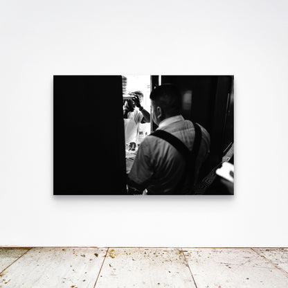 Chloe Albert's fine art print 'Sadelle's' shown unframed at 60 by 40 inches on a gallery wall above a concrete floor, displaying the large statement size in a room.
