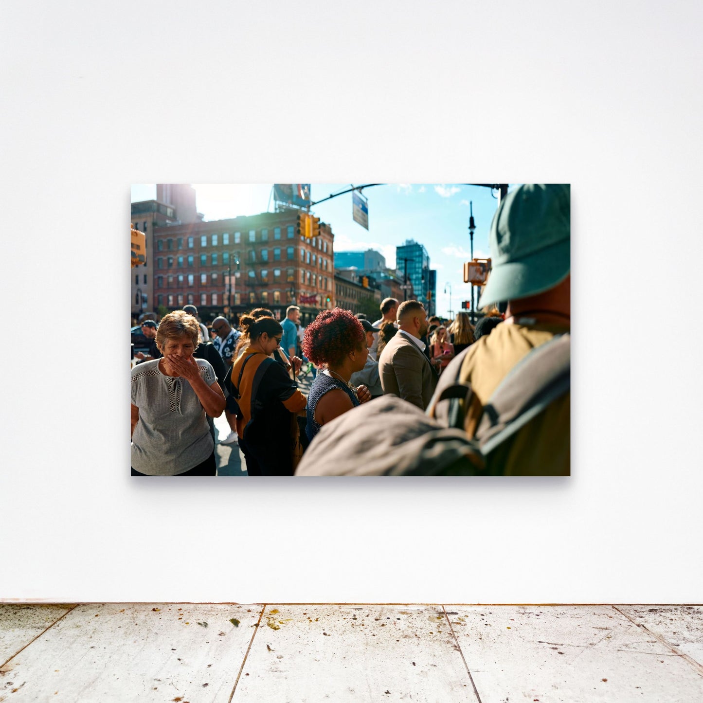 Chloe Albert's fine art print 'Shocked Woman' shown unframed at 60 by 40 inches on a gallery wall above a concrete floor, displaying the large statement size in a room.