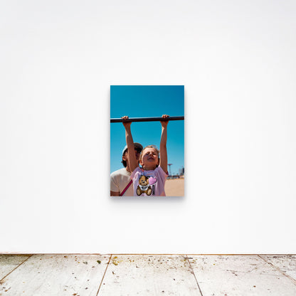 Chloe Albert's fine art print 'Suspended' shown unframed at 36 by 24 inches on a gallery wall, displaying the print at scale in a room setting.