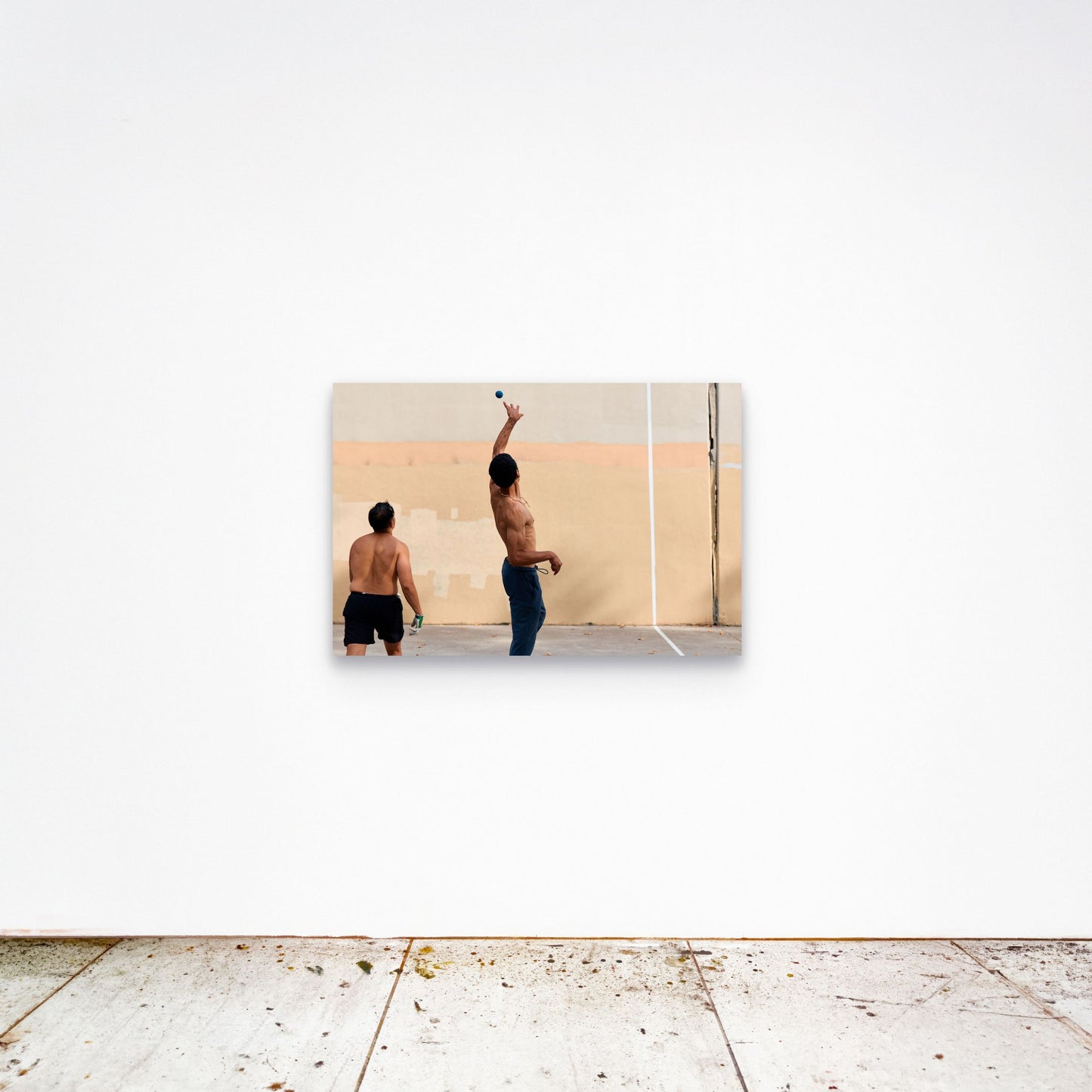 Chloe Albert's fine art print 'Suspension' shown unframed at 36 by 24 inches on a gallery wall, displaying the print at scale in a room setting.