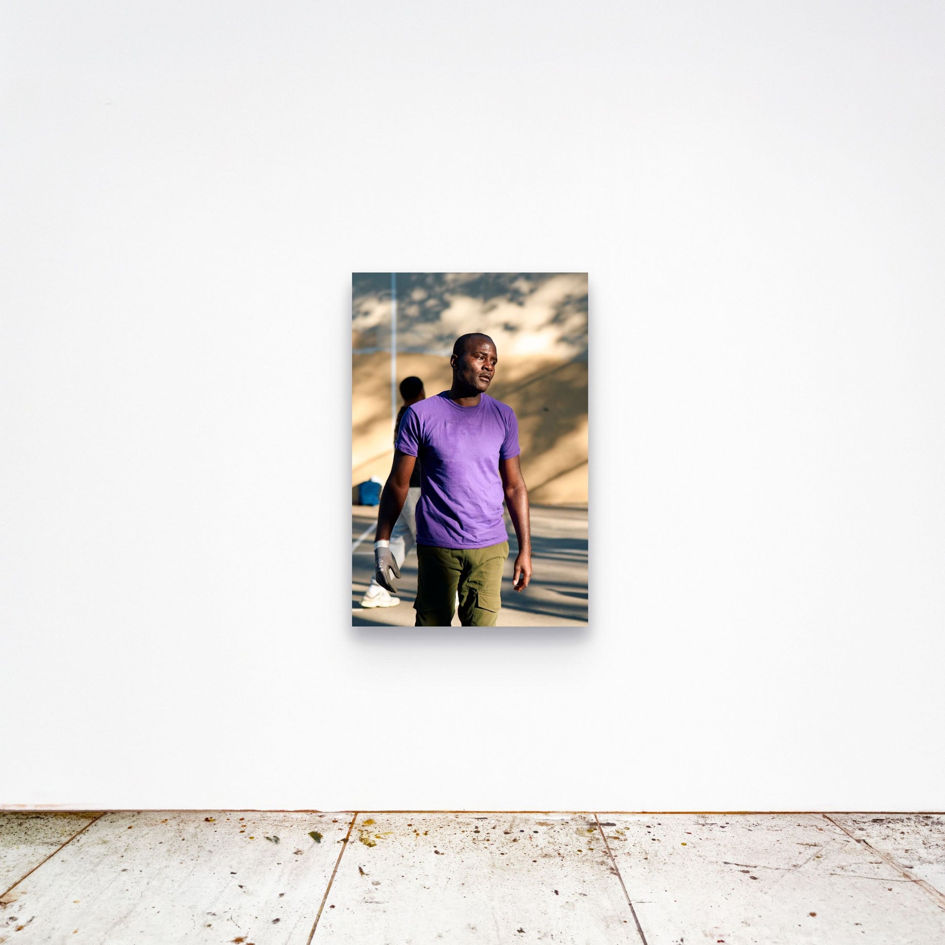 Chloe Albert's fine art print 'Vintage Olympian' shown unframed at 36 by 24 inches on a gallery wall, displaying the print at scale in a room setting.