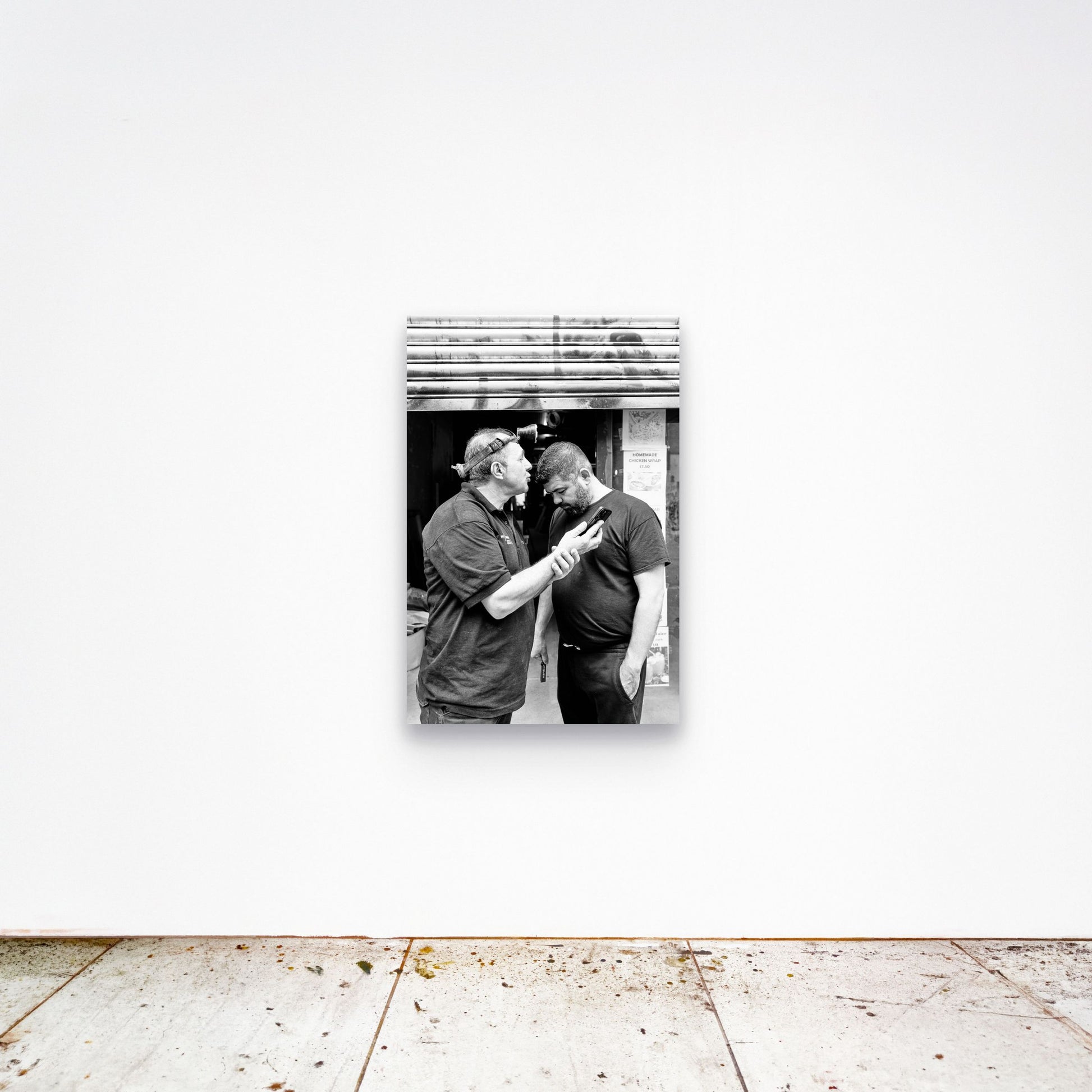 Chloe Albert's fine art print 'Workman' shown unframed at 36 by 24 inches on a gallery wall, displaying the print at scale in a room setting.